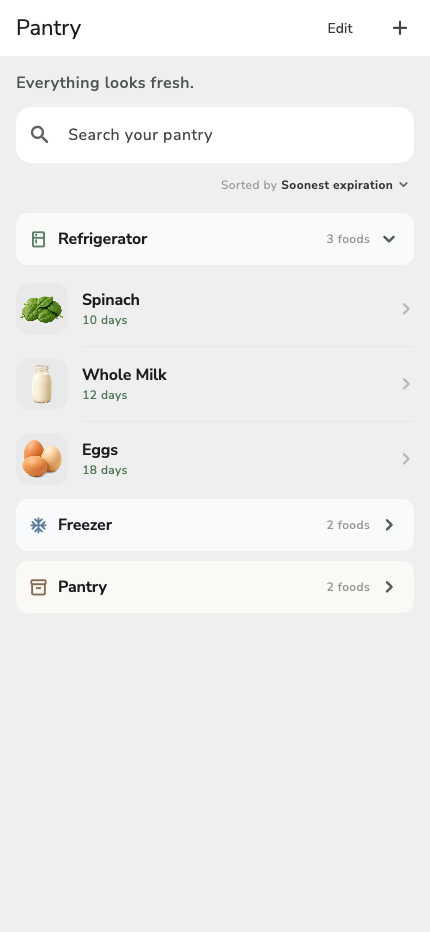 Presova Pantry with refrigerator and storage items expanded